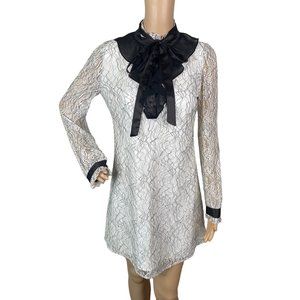 Elegant Lace Dress with Black Accents